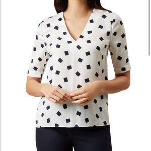White and Navy Geometric Print Top